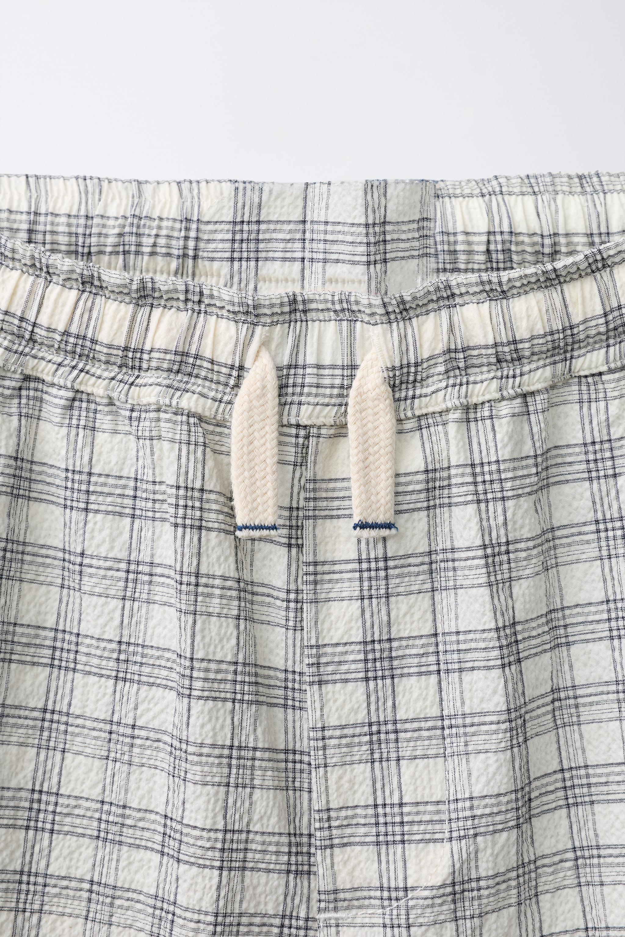 PUKAS SURF PLAID PRINT SHORTS